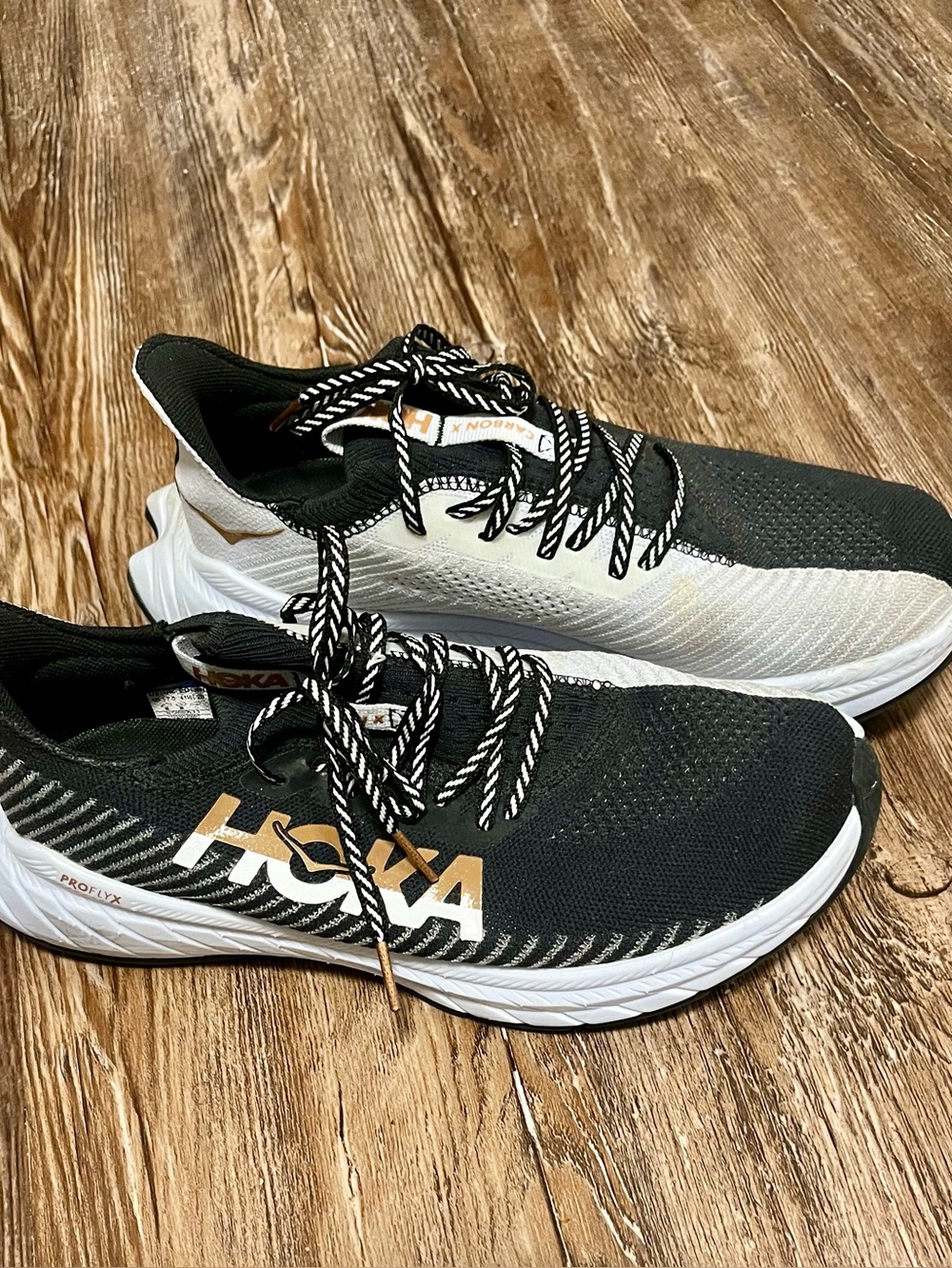 Hoka Womens Black, White and Gold Athletic Running Shoes